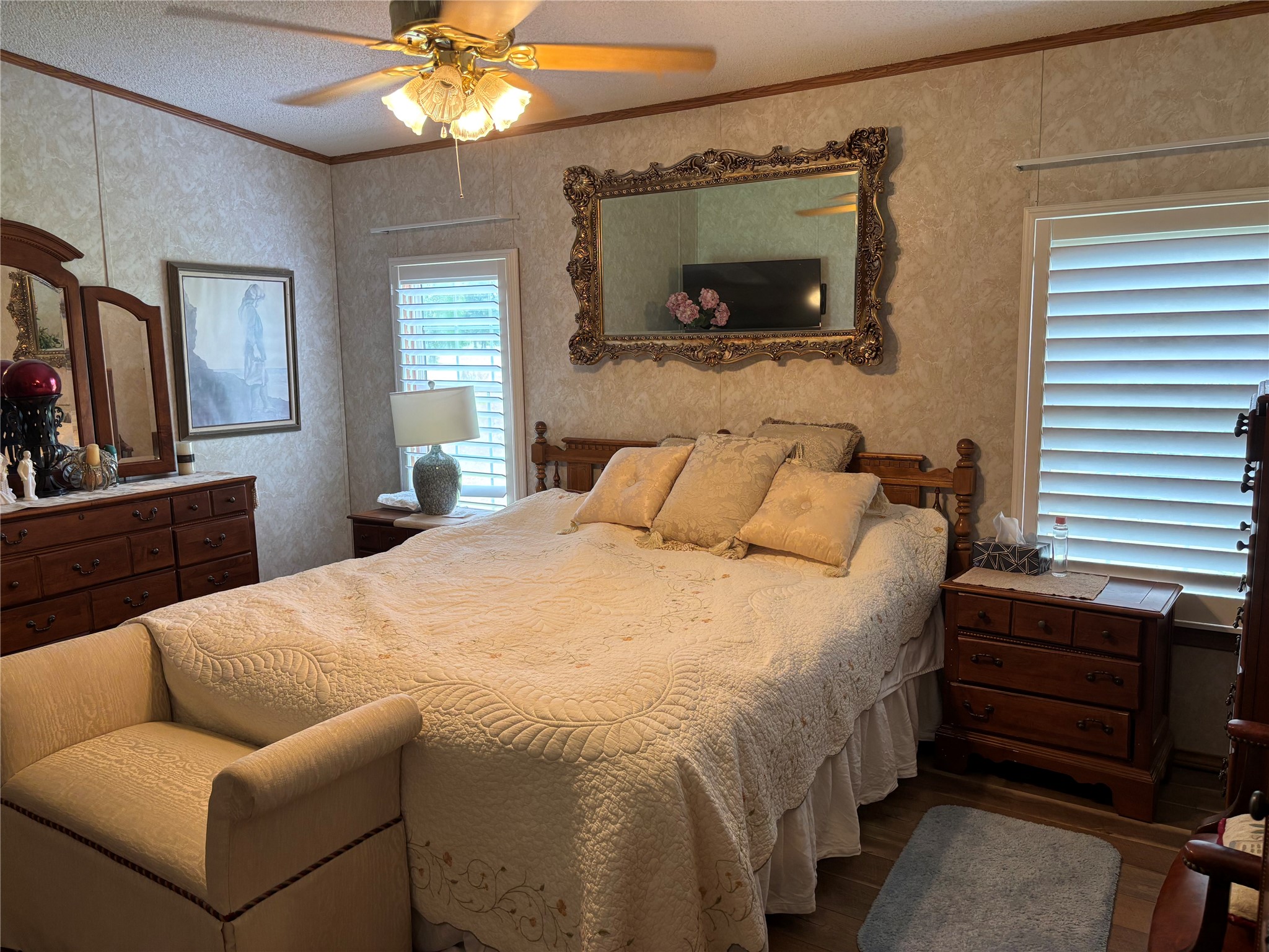 35599 State Highway South Buna, TX 77612 - Photo 25 of 40 a bedroom with a bed and a flat screen tv