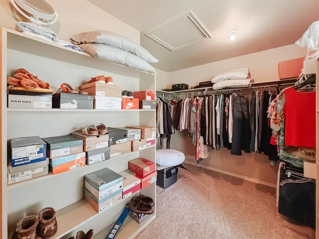 a room with gym equipment and a mirror