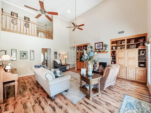 a living room with furniture and a rug