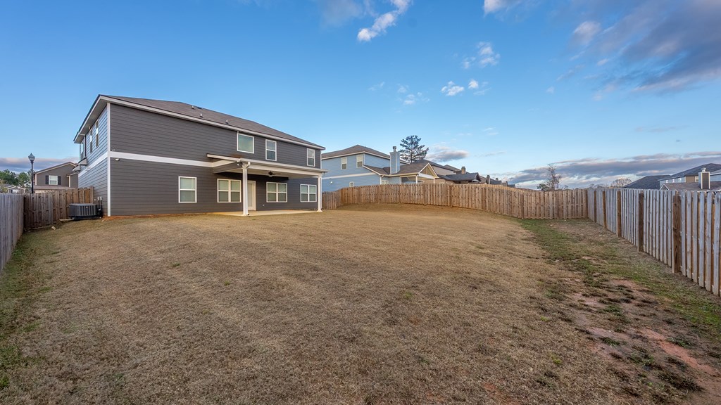 7312 Pine Chase Drive Midland, GA 31820 - Photo 45 of 51 a view of a house with a backyard