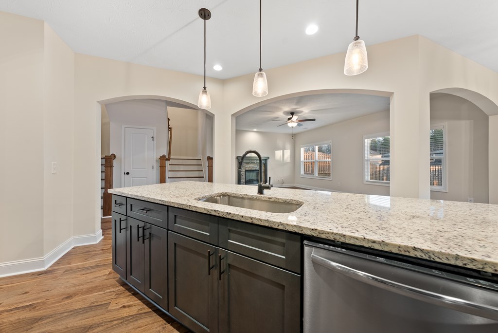 7312 Pine Chase Drive Midland, GA 31820 - Photo 10 of 51 a kitchen with a sink and a wooden floor