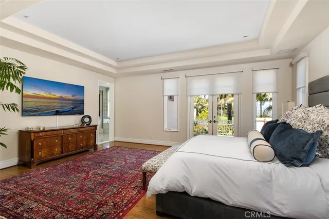 a front view of a house with garden and porch