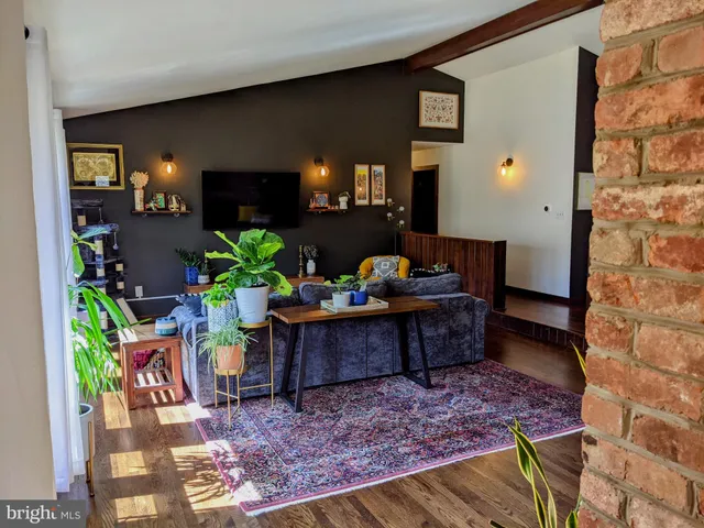 a living room filled with furniture