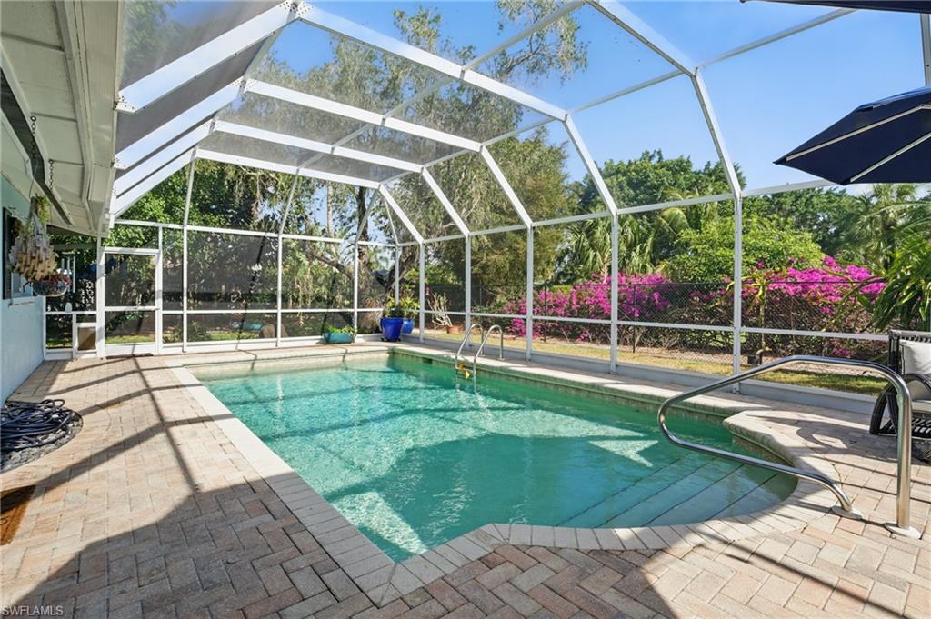 261 Viking Way Naples, FL 34110 - Photo 27 of 40 a view of a backyard
