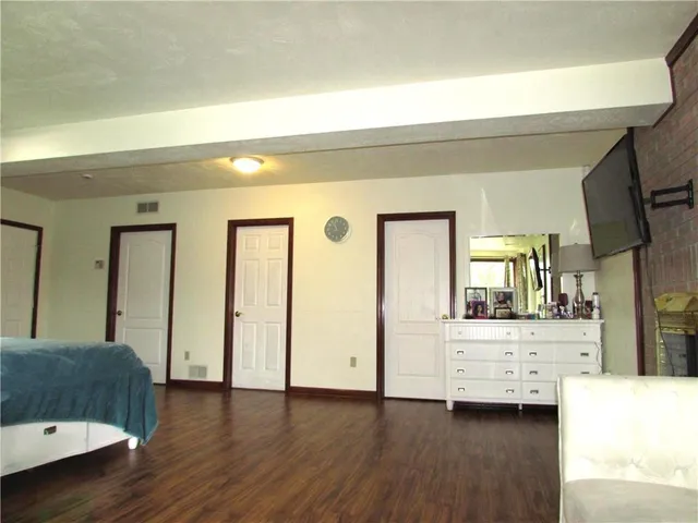 a view of front door with yard