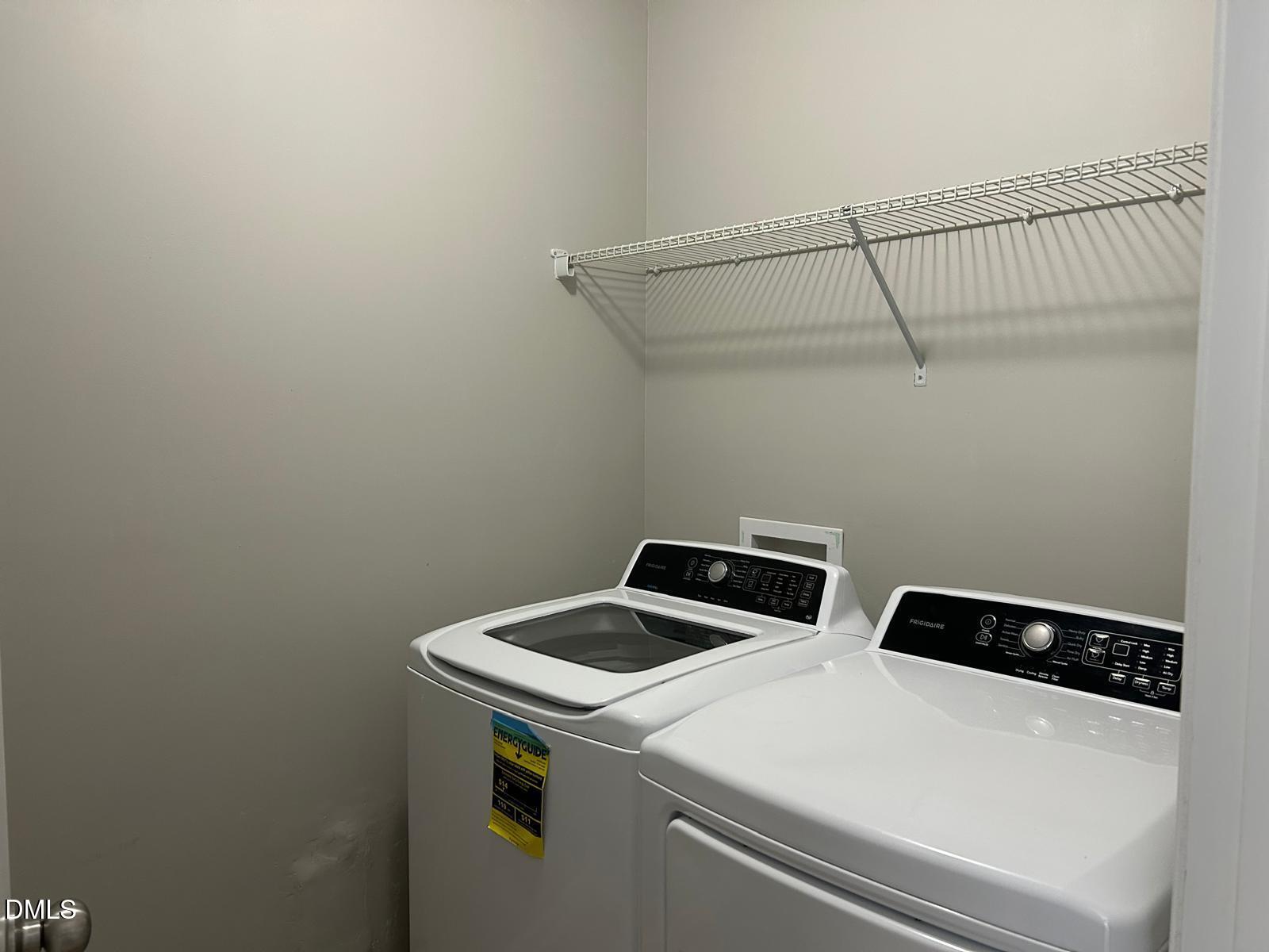 1524 Ricochet Drive Raleigh, NC 27610 - Photo 12 of 17 a utility room with dryer and washer