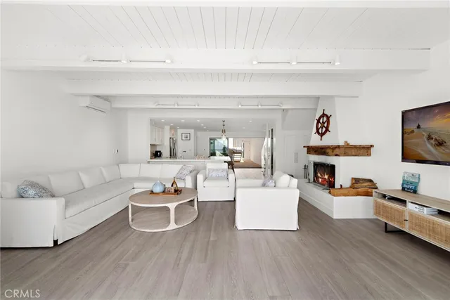 a kitchen with a white cabinets and white appliances