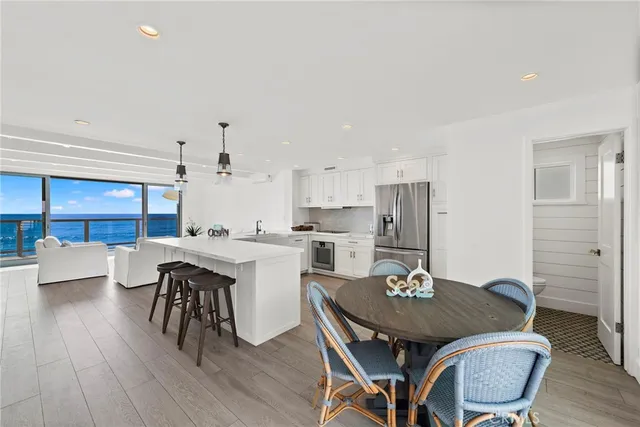 a view of a porch with a floor to ceiling window