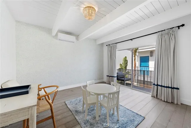 a bathroom with double vanity sinks and a mirror