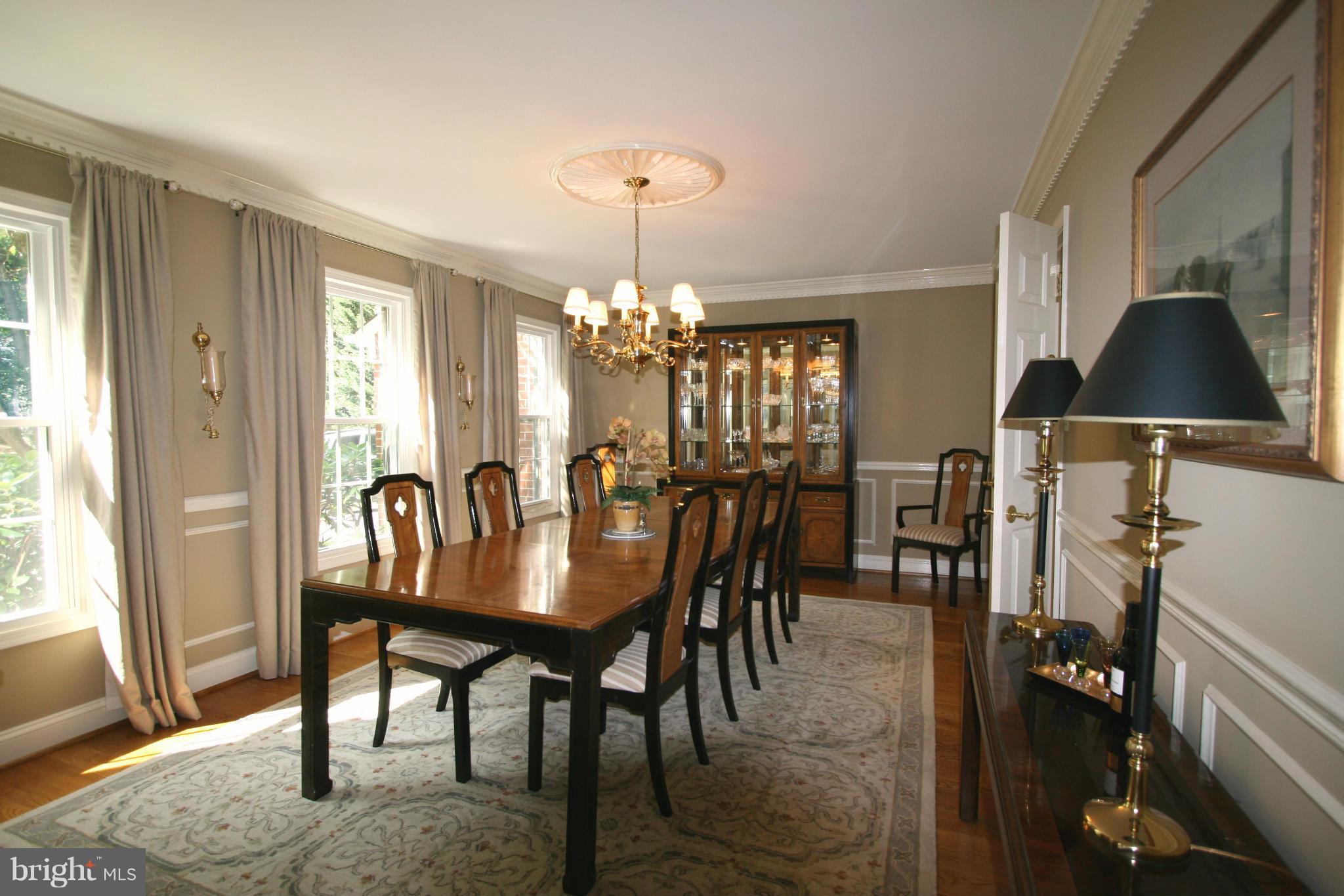 11939 Riders Lane Reston, VA 20191 - Photo 2 of 30 a dining room with furniture and window