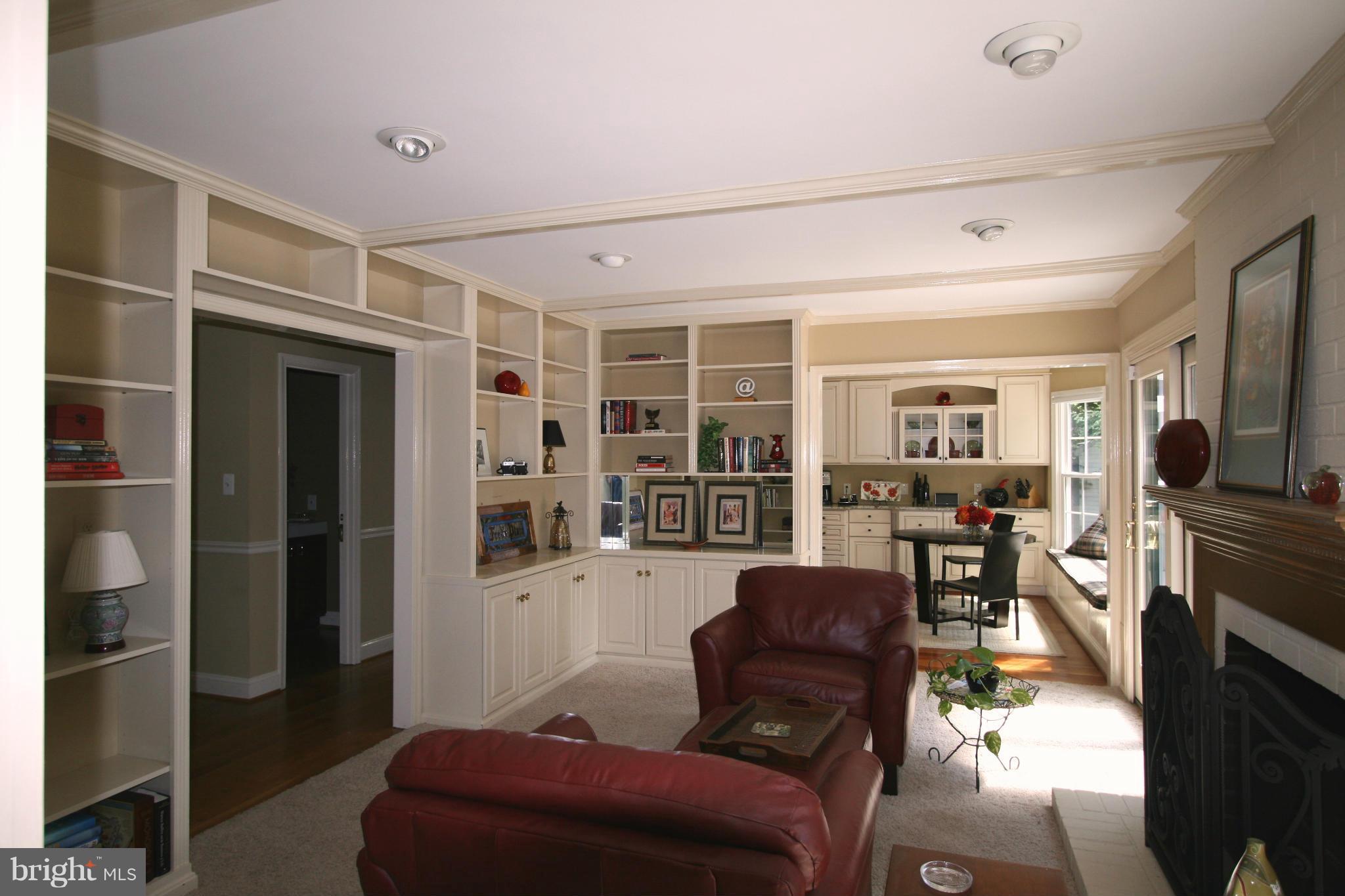 11939 Riders Lane Reston, VA 20191 - Photo 17 of 30 a living room with furniture and a flat screen tv