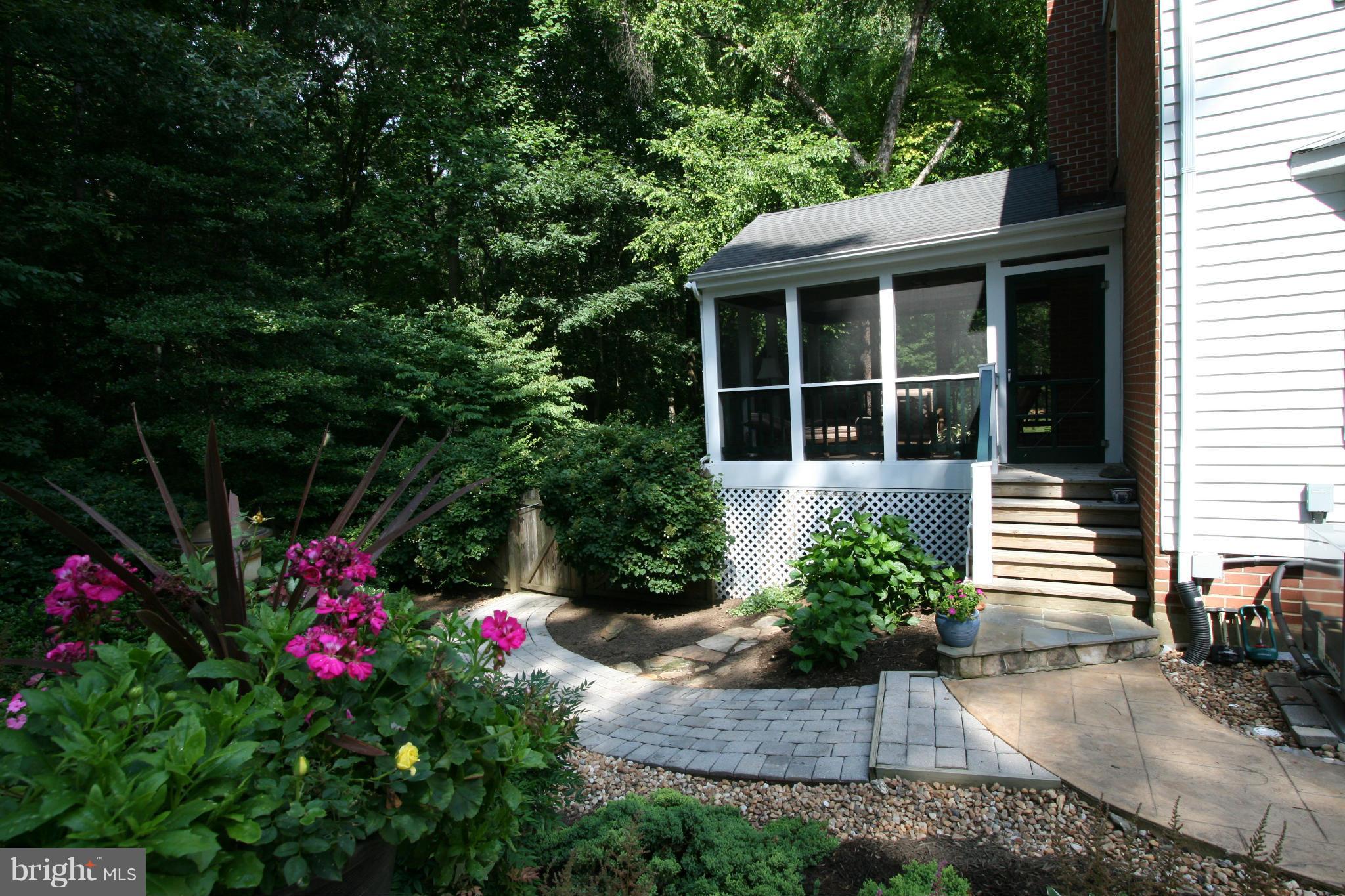11939 Riders Lane Reston, VA 20191 - Photo 20 of 30 a front view of a house with a yard