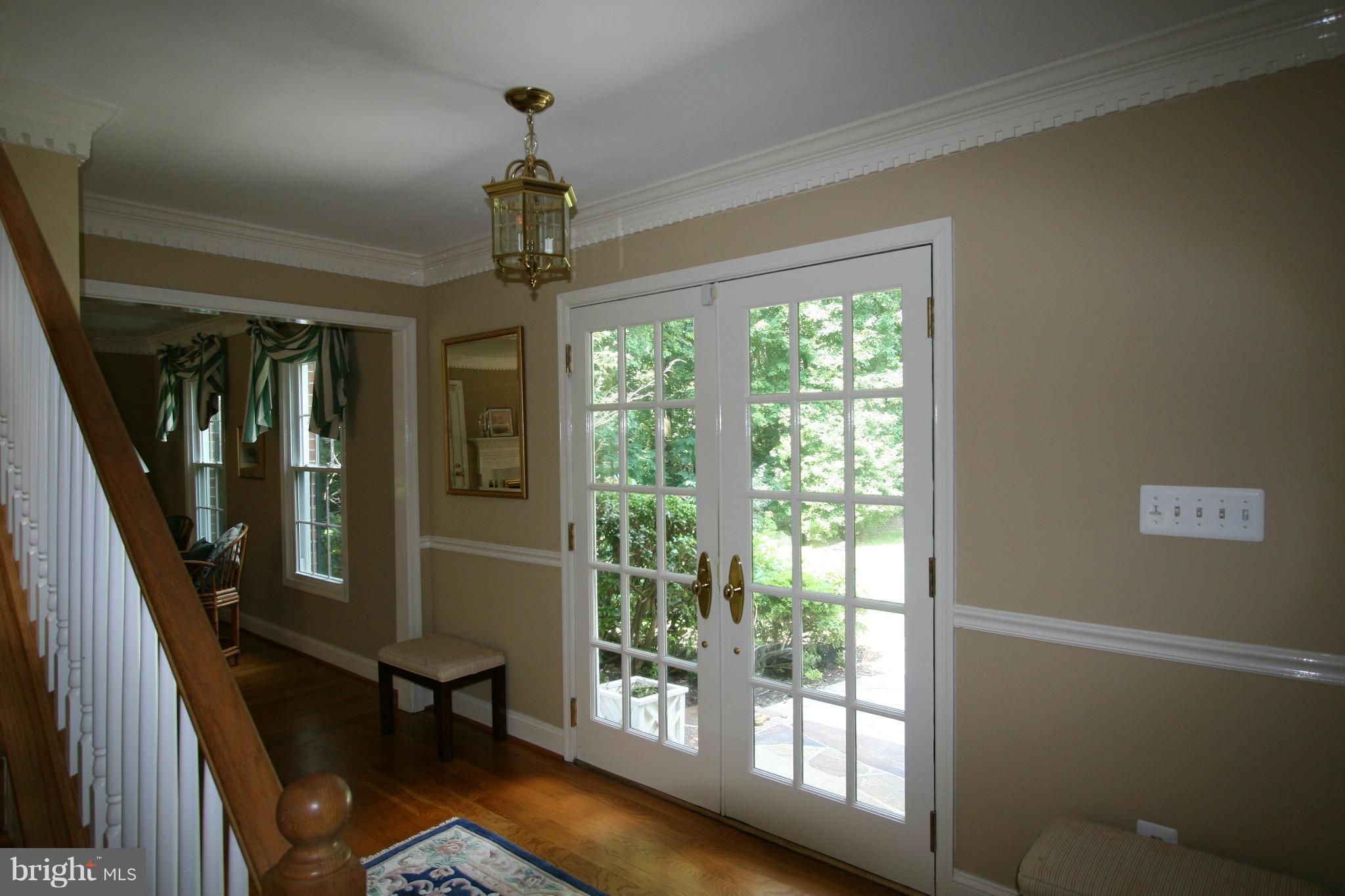 11939 Riders Lane Reston, VA 20191 - Photo 4 of 30 a view of a livingroom with wooden floor and furniture