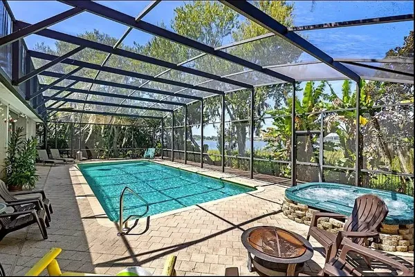a patio with a yard table and chairs
