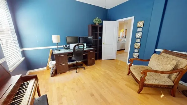 a workspace with furniture and bedroom