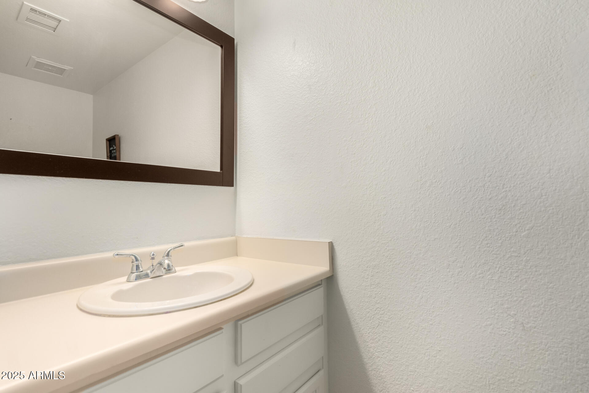 7977 West Wacker Road, Unit 171 Peoria, AZ 85381 - Photo 9 of 26 Downstairs powder room