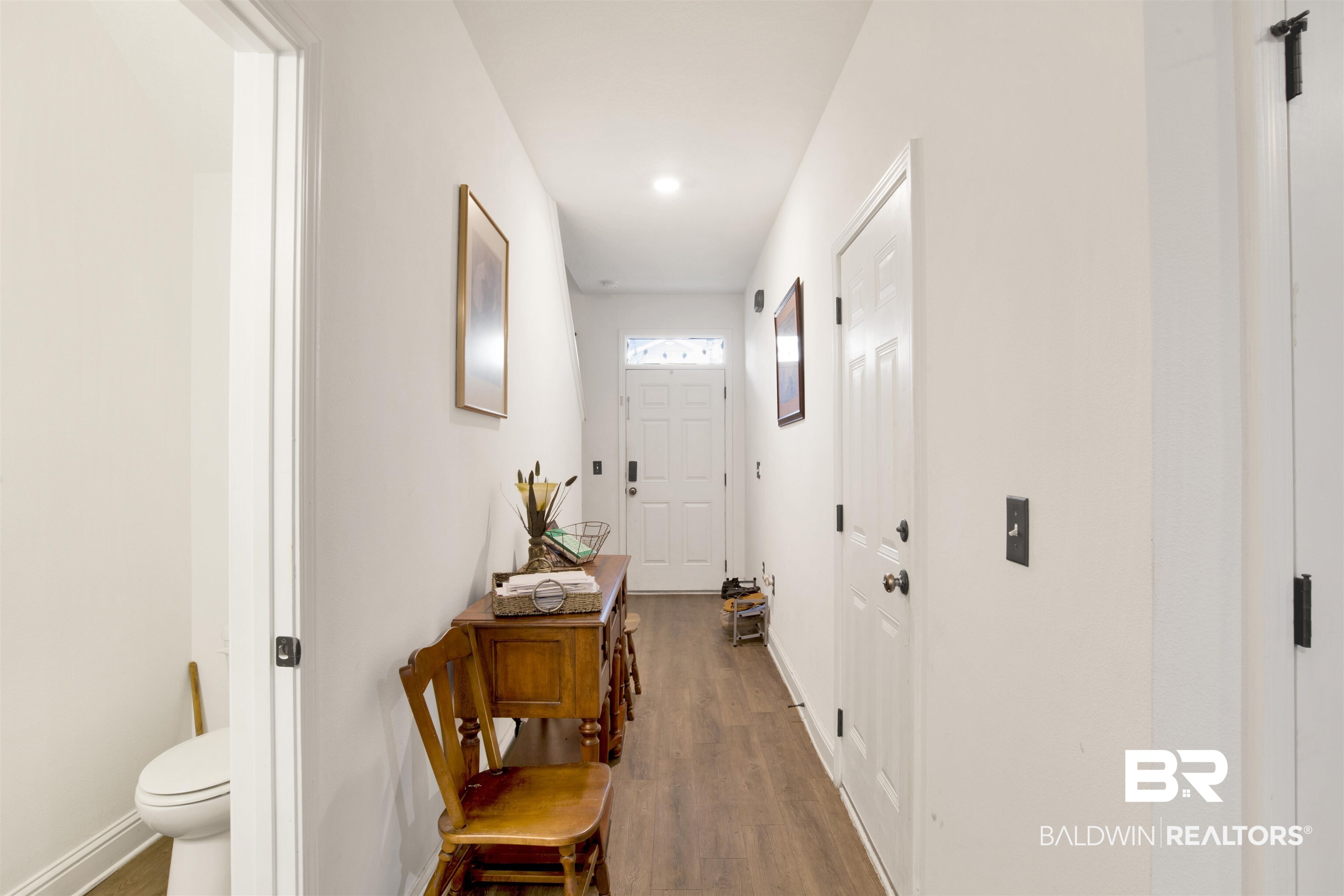 25806 Pollard Road, Unit 80 Daphne, AL 36526 - Photo 12 of 30 Hall with wood finished floors and recessed lighting