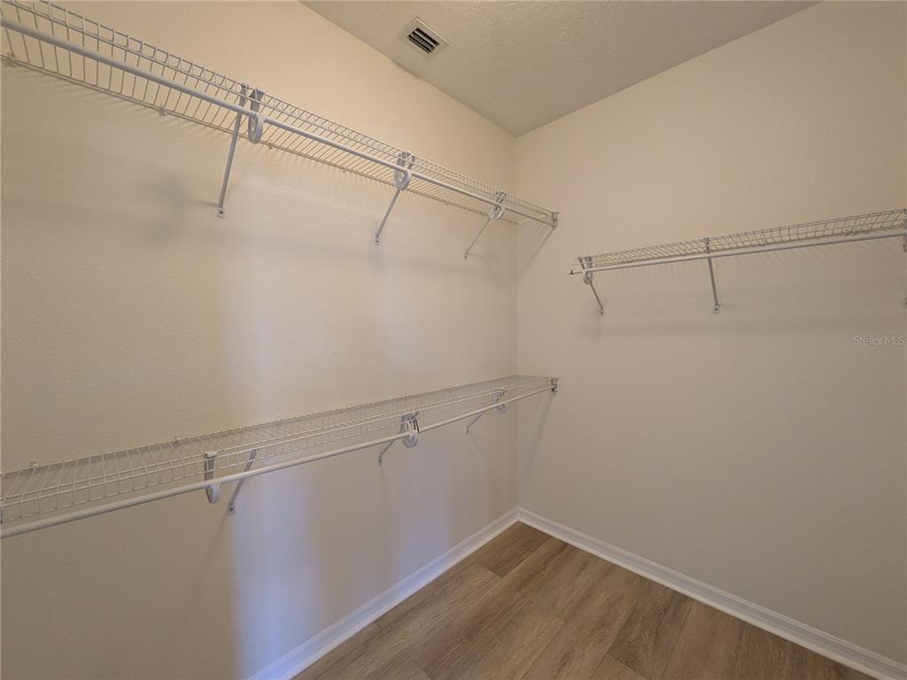 11562 Amidship Lane, Unit 208 Windermere, FL 34786 - Photo 25 of 31 a view of a room with racks on the wall