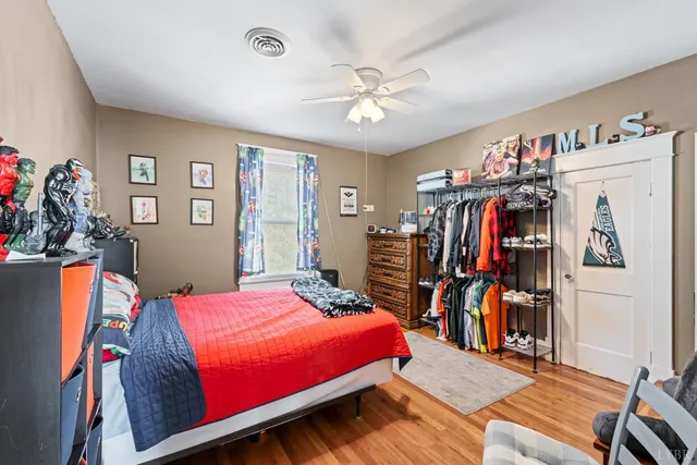 a bed room with a bed and a walk in closet
