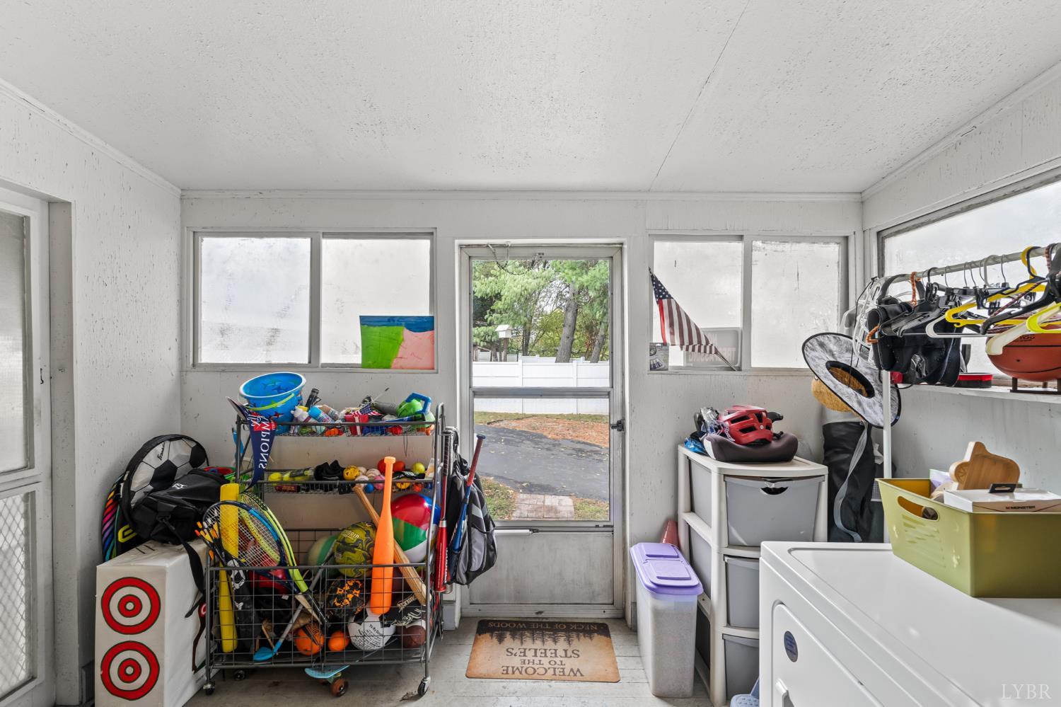 809 Broad Street Altavista, VA 24517 - Photo 41 of 50 a room with furniture a rug toys and windows