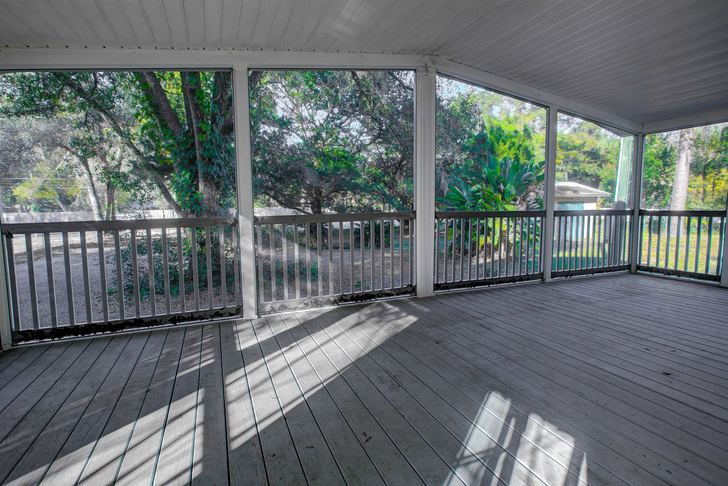 501 Hayley Road St. Augustine, FL 32086 - Photo 35 of 49 Wooden deck with a sunroom