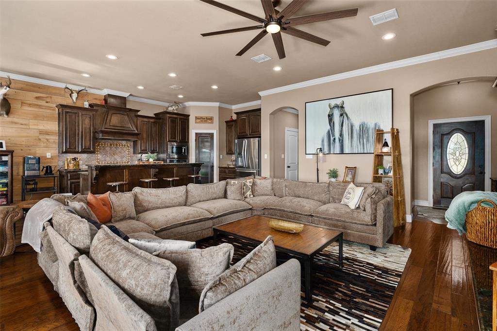 279 Lake Road Plain Dealing, LA 71064 - Photo 18 of 38 a living room with furniture and a wooden floor