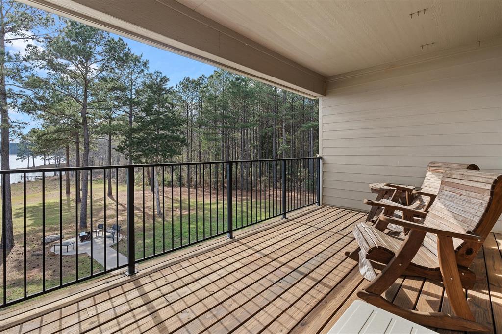 279 Lake Road Plain Dealing, LA 71064 - Photo 35 of 38 a balcony view with a outdoor seating