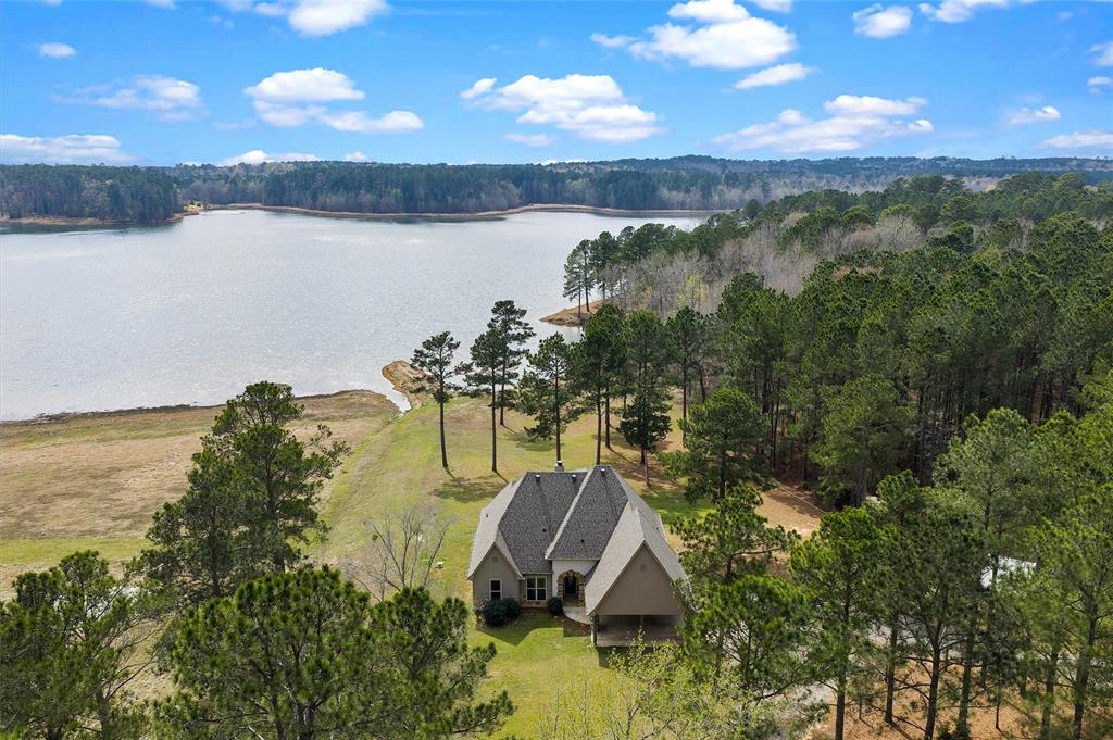279 Lake Road Plain Dealing, LA 71064 - Photo 5 of 38 a view of a lake with a mountain