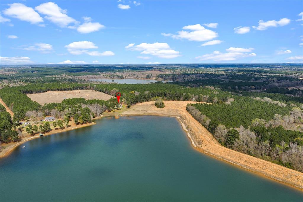 279 Lake Road Plain Dealing, LA 71064 - Photo 10 of 38 a view of a lake from a balcony