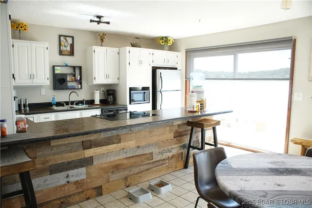 $694,000 | 29744 Clark Road, Gravois Mills, MO 65037