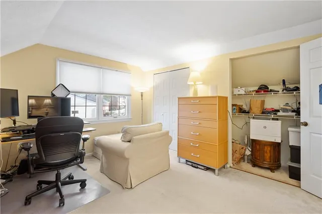 a view of a livingroom with furniture and a couch