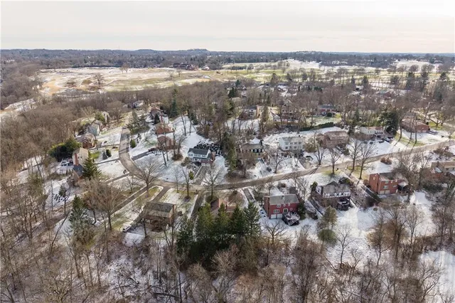 an aerial view of residential house and lake view