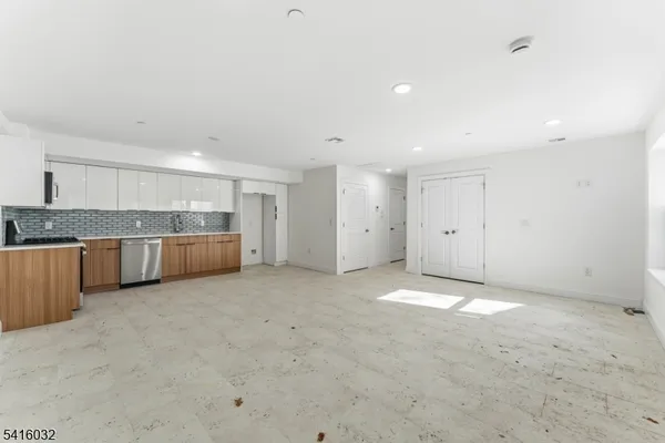 a view of a kitchen with a sink