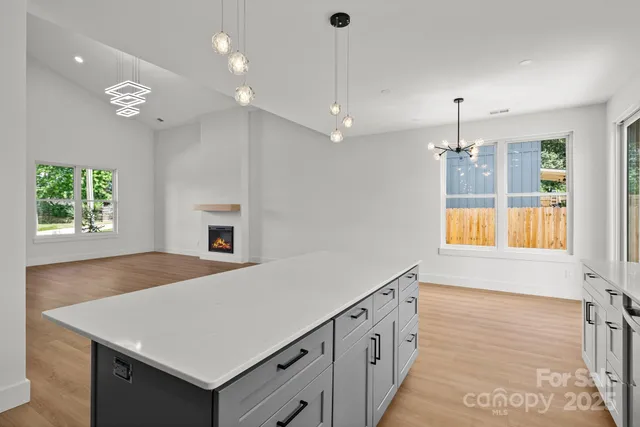 a view of a dining room kitchen and a window