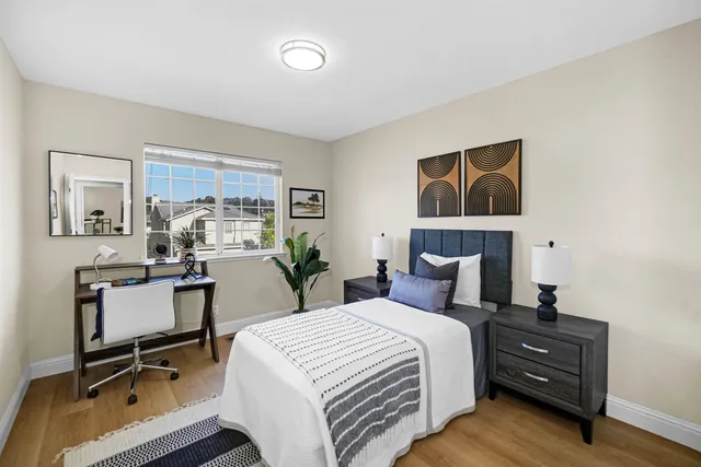 a view of house with backyard and patio