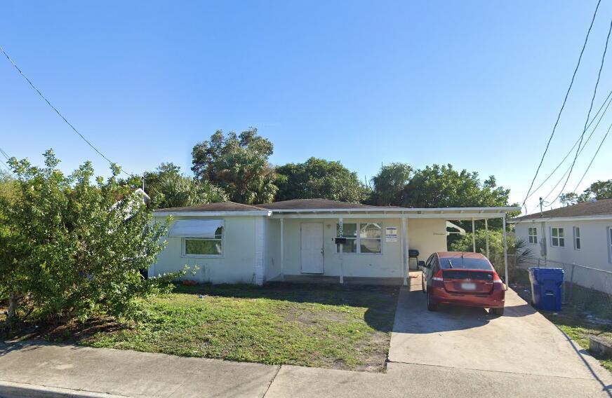 1209 West 34th Street Riviera Beach, FL 33404 - Photo 1 of 1 front