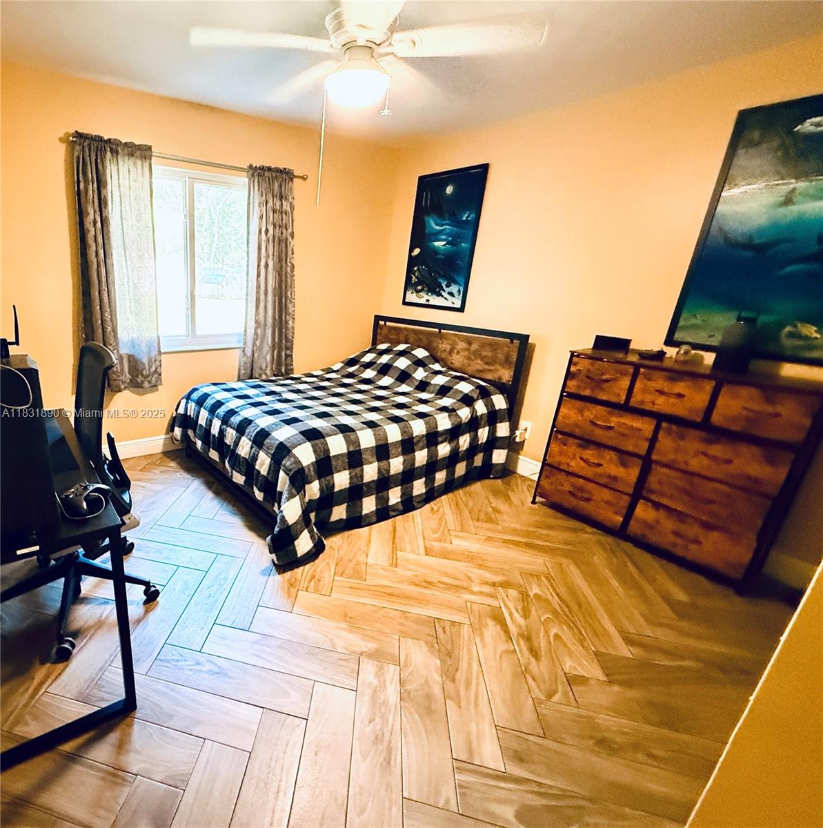 2980 Southwest 82nd Way Davie, FL 33328 - Photo 19 of 39 a bedroom with double bed and a window