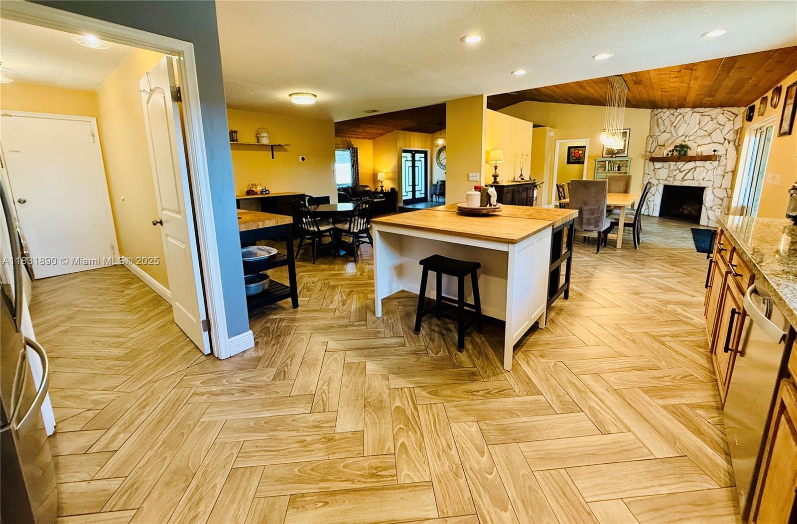 2980 Southwest 82nd Way Davie, FL 33328 - Photo 9 of 39 a room with lots of tables a window and couch