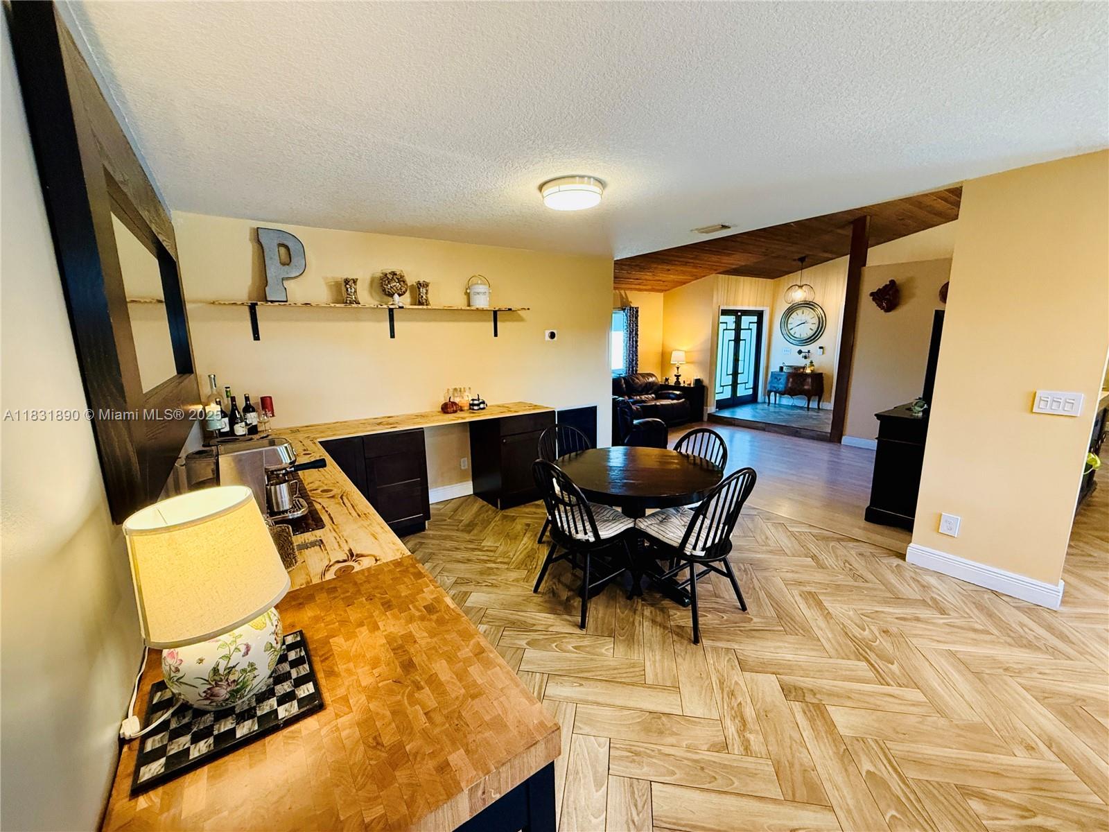 2980 Southwest 82nd Way Davie, FL 33328 - Photo 10 of 39 a view of a dining room with furniture