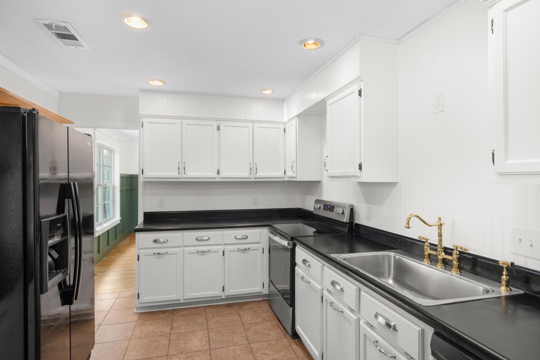 1388 Double Bridges Road Munford, TN 38058 - Photo 4 of 32 New sink, faucet, shelving, paint