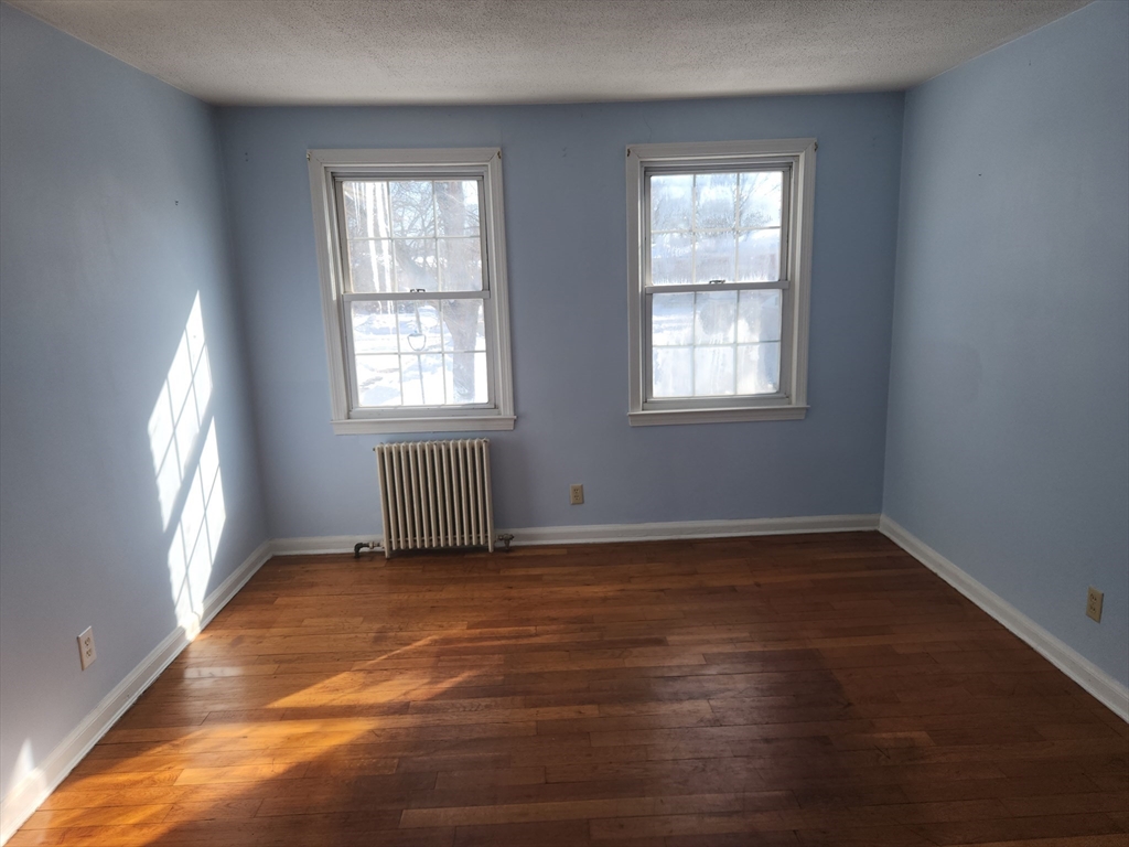 456 Cold Spring Avenue, Unit 2A West Springfield, MA 01089 - Photo 3 of 13 a view of an empty room and window