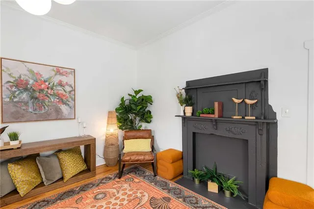 a kitchen with a refrigerator sink and cabinets