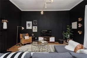 a bed room with a bed and a chair