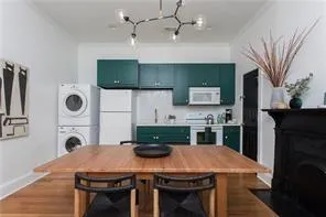 a view of a yard with large trees