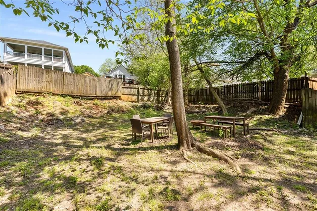 a front view of a house with street