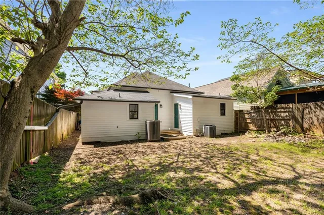 a view of a street with brick building in front of it