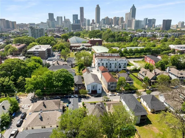 a view of a patio with a table and chairs