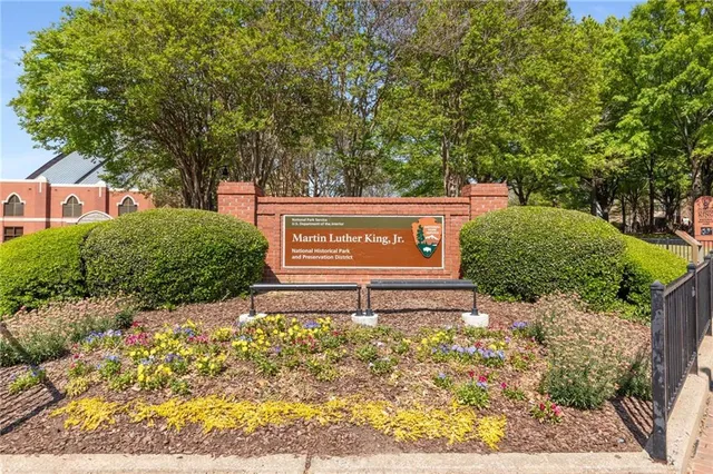 a view of a chairs and table in the patio