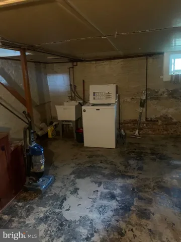 a view of storage and utility room