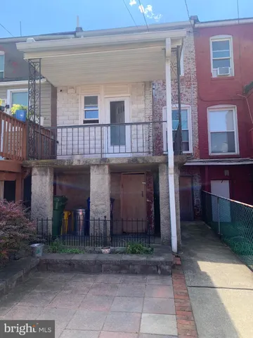 a front view of a house with yard